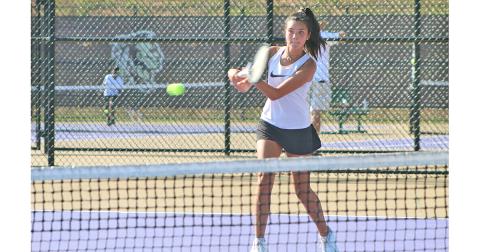 Lumpkin’s Tru Koren returns service during the middle school tennis team’s match versus Tallulah Falls at the LCHS Tennis Complex last week.