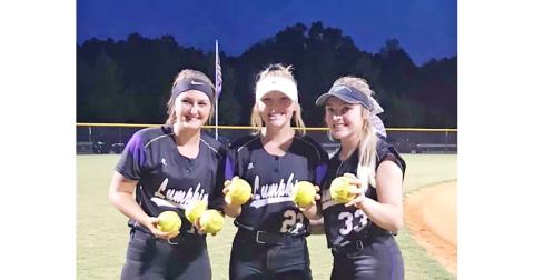 Natalie Shubert, Evee Dornhecker and Lauren English celebrate after connecting for six home runs between them in the Lady Indians’ win over Cherokee Bluff last week. Shubert crushed three home runs, Dornhecker blasted two home runs and English connected for one home run in the 13-5 victory.