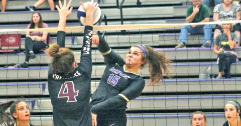 Lumpkin County’s Reagan Spivey goes up strong at the net to score a point versus Chestatee last week.