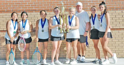 The Lumpkin County Middle School girls celebrate their win over Gilmer County in the Mountain League Championship last week. The championship title is the second straight for the team.
