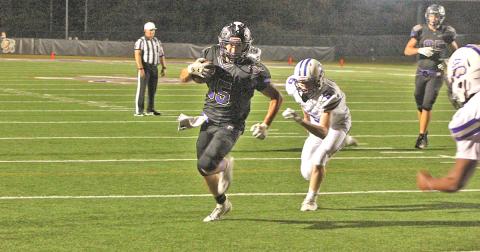 Running back BoJack Dowdy finds his way into the end zone late in the fourth quarter against the Cherokee Bluff Bears.