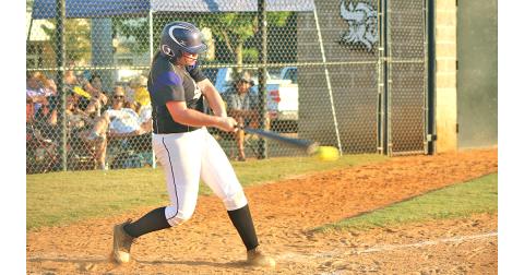 Lady Indians second baseman Alyssa Pulley connects for a hit against East Hall’s Macy Banks during the region champ-ionship series.