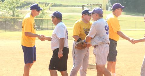 Members of the LC Miners and the Dahlonega Gold shake hands after the Miners defeated the Gold in the first round of the Clayton League Championship tournament last week.
