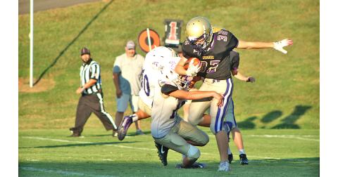 Lumpkin running back Mason Sullens keeps his feet to pick up some big yards for the Indians in the team’s final regular season game against the Union County Panthers.
