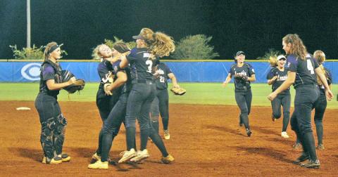 The Lady Indians celebrate their sweep of the Crisp County Lady Cougars in the Sweet 16 round of the GHSA State Softball Playoffs on Oct. 16.