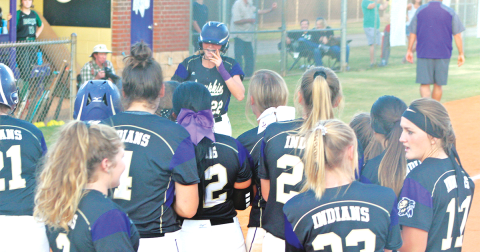 Lady Indian shortstop Evee Dornhecker is greeted by her teammates at home plate after she crushed a grand slam versus the North Hall Trojans last week.