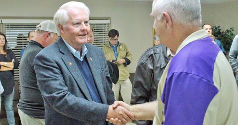 Dahlonega City Councilman Ron Larson is congratulated by County Commissioner Bobby Mayfield on election night.
