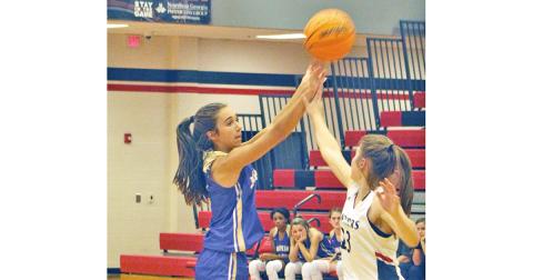 Lady Indians point guard Isabel Davenport goes up and drains a contested three-pointer against the Lady Panthers. Davenport knocked down 22 points in the Lumpkin victory.
