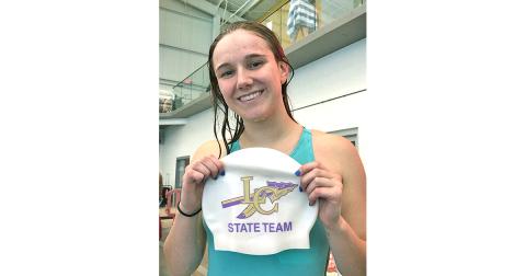 Lady Indians swimmer Faith Schofield celebrates qualifying for the State Swim Meet in the girls 100 yard freestyle during the LCHS swim team’s first meet of the 2019-2020 season.