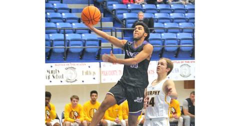 Pat Jackson lays up two of his 21 points in Lumpkin's first round win over Murphy, N.C. at the Battle of the States tournament.