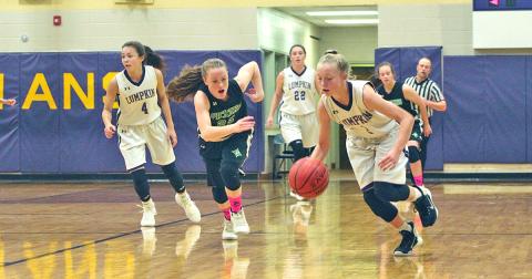 Ciera Brooks forces a turnover and starts a fast break opportunity for the eighth grade girls basketball team in the Lady Indians’ redemption win over Pickens County last week.