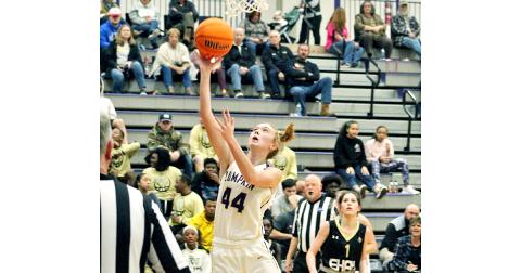 Senior center Madisyn Echols scores two of her six points in the Lady Indians’ loss to region foe East Hall last Friday night.
