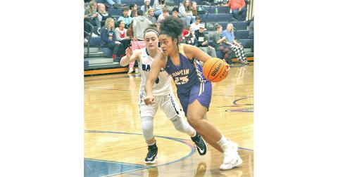Freshman Kate Jackson drives to the basket for two of her 17 points in the Lady Indians’ win over the Banks County Lady Leopards on the road on Friday, Dec. 20.