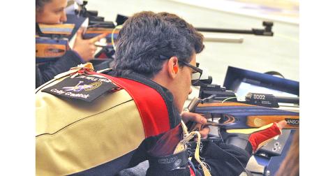 LCHS rifle team captain Colby Craddock takes aim during competition. Craddock earned Top Gun honors for the Indians to help Lumpkin eke out a win versus Duluth High School at the Indian Hunting Grounds last Thursday, Dec. 19.