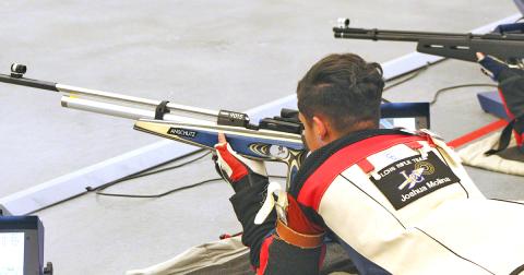 LCHS sophomore shooter Joshua Molina takes aim during the prone portion of competition. Molina shot perfect scores in prone and kneeling to help the Indians defeat North Forsyth last week, improving the team’s overall record to 5-1.