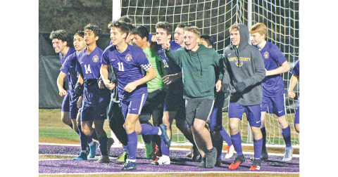 The Lumpkin varsity boys soccer team celebrates after defeating Murray County in penalty kicks to earn the team’s first win of the 2020 season.