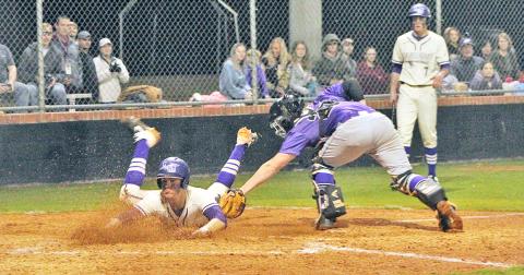 Lumpkin County’s Dalton Caldwell slides safely into home plate to score a run in Lumpkin’s 3-0 win over the Union County Panthers in their 2020 home opener on Tuesday, Feb. 25.