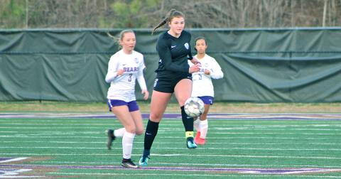 Lumpkin midfielder Reagan Spivey clears a ball during the high school team’s win over Cherokee Bluff. Spivey scored one of the six goals for the Lady Indians in the victory.