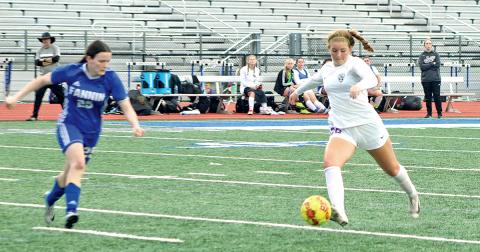 Midfielder Ashley Read takes a shot on goal versus the Fannin County Lady Rebels.