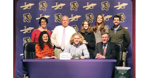 LCHS tennis star Laken Ferrell (center front) celebrates signing with Piedmont College at a recent signing ceremony held at the LHS auditorium. Pictured (back row, left to right): Abbey Ferrell, LCHS head tennis coach Alan Hogan, Claire Stephens, Erin Ferrell and Jay Ferrell. (Front row): Ferrell’s mother Paige Ferrell and Ferrell’s father Steve Ferrell.