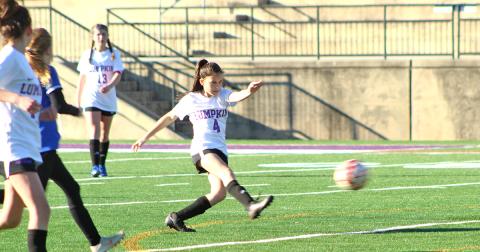 Lumpkin’s Della Marshall boots in one of her two goals in Lumpkin’s 10-0 win over the Fannin County Lady Rebels last week.