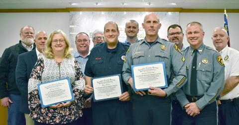 Donna Taylor from the Planning Department (front row, left to right), Fire/EMS’s Alex Miller and SRO Officer George Albert Sr. are Lumpkin County’s 2020 Employees of the Year. The trio were honored at last month’s BOC meeting. Standing with those being honored are (back row, from left) Public Works Director Larry Reiter; Commissioner Jeff Moran; EMS Director David Wimpy; Commissioners David Miller, Rhett Stringer, Chris Dockery; Sheriff Stacy Jarrard; and Commissioner Bobby Mayfield.