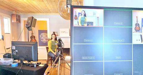 Connectability Executive Director Jacqueline Daniel reads a children's book on camera at App Studios as part of the Smalltown Celebrity Story Time. (Photo by Matt Aiken)