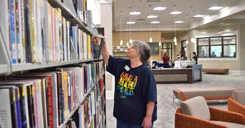 Lumpkin County’s new and improved library is ready, but still waiting for safety clearance, before staff members like Susie Schnebelen can officially open and welcome the public. (photo by Matt Aiken)