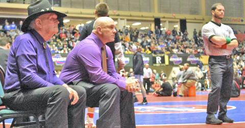 LCHS head wrestling coach Sean Hage (pictured here with LCHS assistant coach Ed Wright on the left) believes that the rules changes the NFHS made recently were a step in the right direction.