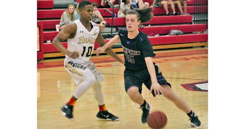 Former LCHS basketball standout Jack Howard dribbles past a defender for two points, displaying the skills that helped him become a UNG Nighthawk. Howard, who stepped away from the sport he loved for a short time, will be back on the court for his last year of college eligibility after transferring to Reinhardt University and joining the Eagles’ basketball program.