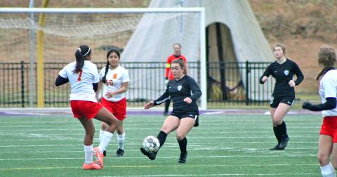 Katy Carroll boots the ball forward to her strikers during a match this past season. Carroll and the other 11 Lady Indian senior players were all selected for the Region 7-AAA All-Region team recently.