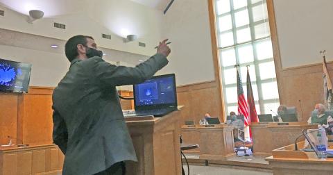 University of North Georgia astronomy assistant professor Dr. Gregory Feiden shares possible solutions to local light pollution during a presentation to the city council.