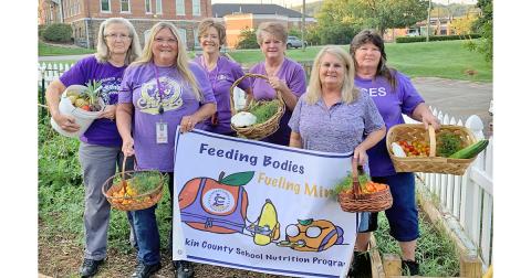 Pictured (from left): Judy Shubert—Long Branch Elementary Cafe Manager, Andi Foster—Blackburn Elementary Cafe Manager, Julie Knight-Brown—Lumpkin Schools Nutrition Director, Kathy Fleming—Lumpkin High School Cafe Manager, Vicki Carpenter—Lumpkin Middle School Cafe Manager and Brenda Christy—Lumpkin Elementary Cafe Manager show off the recent harvest.