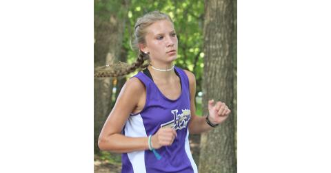 Lady Indians star runner Abbie Hilchie leads the pack halfway through the Union County Invitational. Hilchie led the team to a first place team finish with a fifth place individual finish at the 2020 season opening meet.
