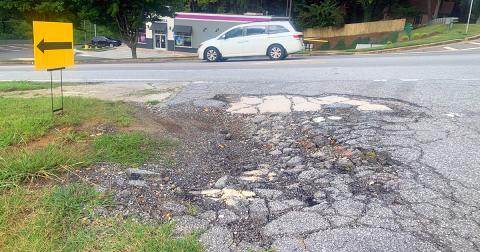The much-traveled entrance of Mechanicsville Road off Morrison Moore Parkway is crumbling and in need of repairs.