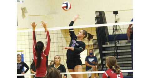 Lady Indians player Makenzie Caldwell records a kill against North Oconee. Caldwell was instrumental in Lumpkin’s victory over North Oconee last week and in the team’s historic 12-1 start to the 2020 season.