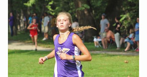 Runner Abbie Hilchie sprints the last leg of the course earlier this season. Hilchie has proven herself to be one of Lumpkin’s top runners again this season.