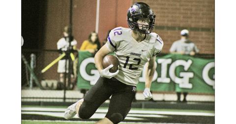 Caleb Norrell carries the ball during a kickoff return against North Hall on Friday. Norrell led the Indians with five receptions for 102 yards and a touchdown as the first Lumpkin receiver to have over 100 yards in one game since Austin Pierce in 2015.
