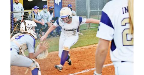 Lumpkin’s Amma Johnson heads home for a play at the plate in the Lady Indians game versus Cherokee Bluff.