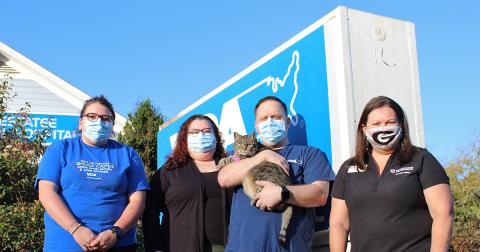 Lumpkin County 4-H is putting on a fundraiser with help from VCA Chestatee Animal Hospital, this Saturday, Oct. 31, as they host a Rabies Clinic at the middle school. Pictured (from left) VCA Chestatee Animal Hospital's Michaela Letson, Melissa Jordan, Kevin Liszak and Ashley the cat, along with Chesley Davis of Lumpkin County 4-H.