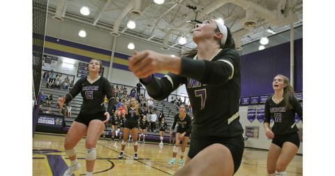 Addie Rucker focuses in to get a perfect set while teammates Reagan Spivey, Isabel Davenport, Kiersta Trammell and Victoria Crotzer look to react in time to get the ball back over the net during Lumpkin’s second round playoff match.