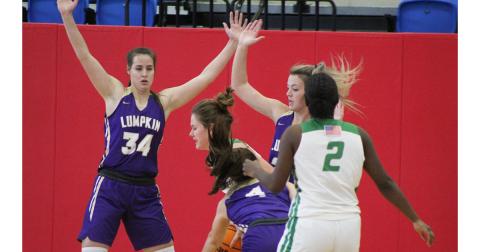 The Lady Indians defense was stout in their game against Franklin County as MaKenzie Caldwell (left) and Madison Powell put pressure on the ball-handler in hopes of forcing a turnover. The suffocating Lumpkin defense allowed only 20 points in its tournament finale, walking away with a 2-1 record to start the season.
