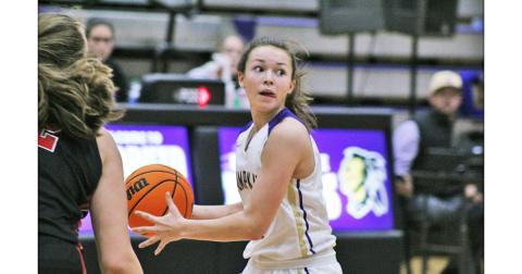 Freshman guard Averie Jones dribbles down the court looking to find an open teammate with a pass during Friday’s loss to Cherokee County. The Cherokee defense kept the Indians under intense pressure all night, making things difficult on the offensive end.