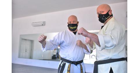 Instructors Brad Bowelle (left) and Wayne Marshall of Brad's United martial arts studio, have taught numerous students skills and techniques that transcend simply fighting another human. When facing hardship due to COVID-19, Bowelle was tasked with practicing the same resolve he preaches against the "unknown opponent" just to keep the doors of his studio open and in business.