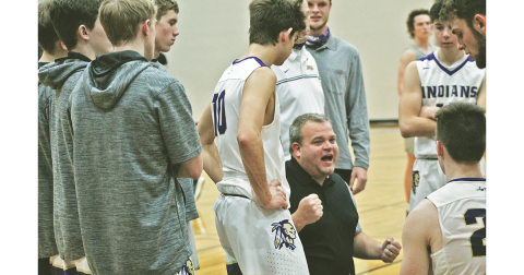 Head coach Michael Parker encourages his team during a timeout in Lumpkin County’s crucial region-win over Gilmer County on Friday. Parker’s team was 9-9 as it headed into yet another crucial region-matchup with North Hall on Tuesday.