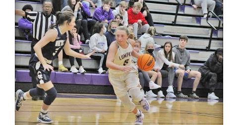 LCHS sophomore Lexi Pierce drives past a defender during Lumpkin’s region game versus White County last Tuesday. The Indians’ one-point overtime loss was their first region loss of the season and only their fourth loss all together this season.