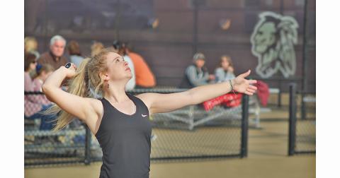 Bella Brock, who plays No. 1 Singles for the LCHS Girls Tennis team, prepares to serve during her match against North Hall.