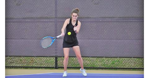Hannah Davis returns a volley back to her opponent during her match against Gilmer on Thursday. The Indians claimed a 4-1 victory over the Bobcats and continued their Region Matching winning streak heading into the final week of the regular season.