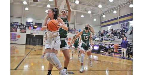 Freshman phenom Averie Jones changes her shot in mid air to duck under the arms of her defender and put the ball back up for a lay in. Jones led the charge, scoring nine of her 27 points in a wild third quarter that saw the Indians increase their lead from six to 26 en route to a Sweet 16 victory.