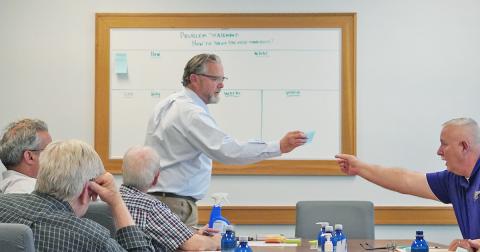 Lumpkin County's Director of Planning Bruce Georgia (left) takes a note from Commissioner Bobby Mayfield during the second Noise Study Committee meeting on Tuesday, April 13. With the mission of coming up with a solution to Lumpkin's noise complaints, the committee brainstormed the idea thoroughly, using the notes to mark each committee member's ideas for the ordinance. 